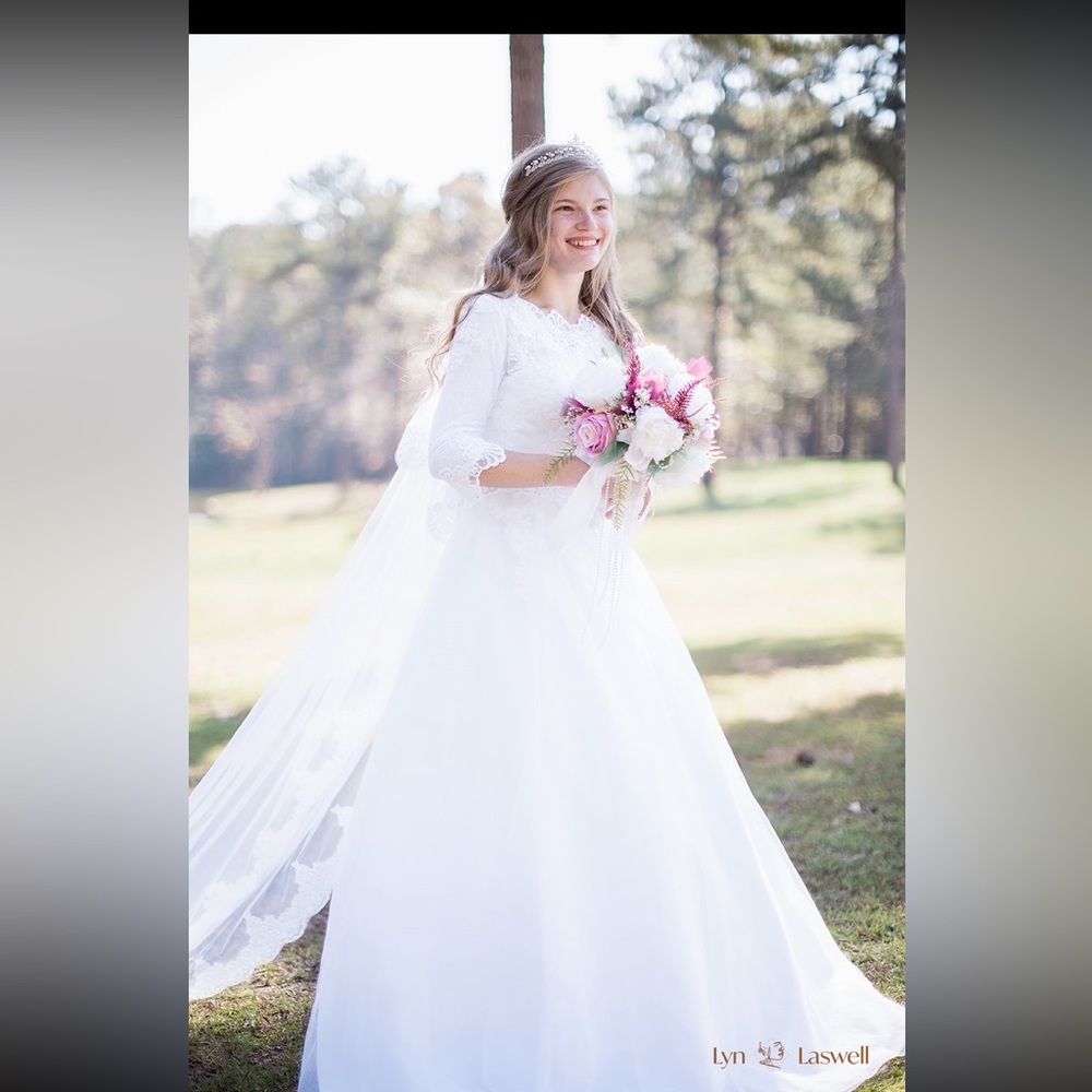 David’s Bridal modest wedding dress and cathedral length veil with blusher